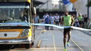 808361-usain-bolt-races-bus